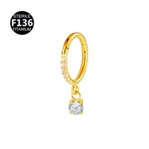 Detailed view of the F136 titanium cartilage piercing ring with sparkly CZ crystals and pendant.