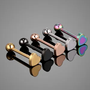 Stainless steel heart tongue ring detail view, multi-color barbell piercing jewelry close up.