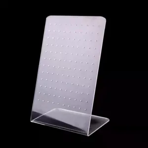 Transparenter Acryl-Ohrringständer, ideal für die Präsentation von Ohrsteckern und Körperschmuck.