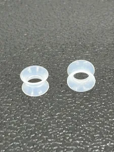 Clear soft silicone double flare ear tunnels detail view, flexible ear stretching plug.