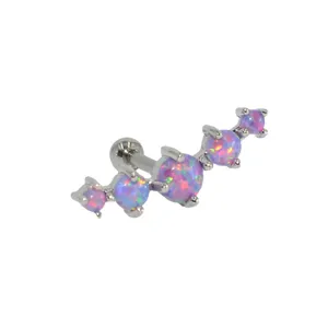 Detailed view of 316L stainless steel curved cartilage piercing stud featuring colorful opals.