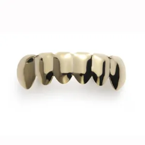 Gold metal teeth grillz detail view, stylish hip hop body jewelry accessory for men and women.
