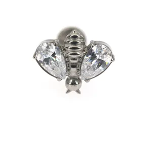Detailed close-up of G23 titanium crystal bee labret stud, sparkling zirconia wings jewelry.