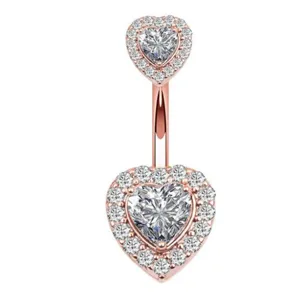 Close-up detail of rose gold double heart belly ring featuring sparkling clear zirconia stones.