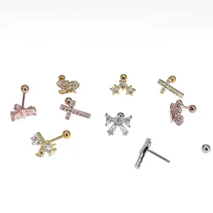 Detailed view of assorted 316L stainless steel cartilage piercing studs with crystal stones.