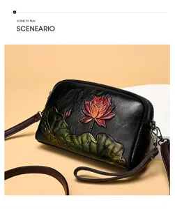 Retro embossed lotus flower shoulder bag detail shot, artistic PU leather ethnic style.