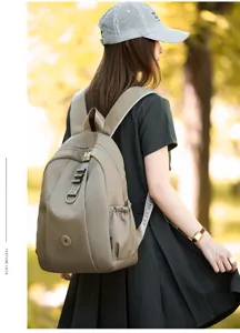 Detail view of the lightweight nylon casual backpack in khaki grey, perfect for outdoor use.