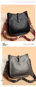 Stylish women's hobo shoulder bag with wide geometric patterned and leopard print straps.