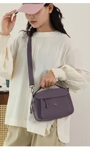 Casual multi-layer nylon crossbody shoulder bag for women, lightweight purple daily purse.