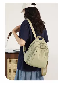 Close-up detail of the casual nylon backpack showcasing durable multi-pocket design.