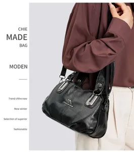 Detail view of a stylish multi-layer large capacity women shoulder bag with elegant design.