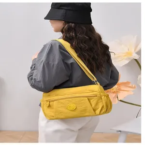 Yellow nylon shoulder bag for women, casual large capacity crossbody bag with multi pockets.