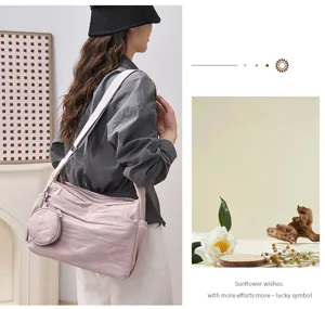 Large capacity casual shoulder bag, stylish nylon tote purse with coin pouch for daily commute.