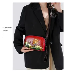 Vintage embossed lotus leather crossbody shoulder bag for women, ethnic style daily purse.