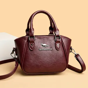 Sac à main élégant pour femme en cuir synthétique, sac bandoulière tendance avec poignée.