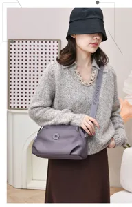 Minimalist nylon casual crossbody bag for women, versatile multi-layer shoulder handbag.