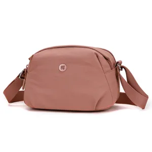 Minimalist casual shell crossbody bag for women, stylish solid color shoulder bag with wide strap.