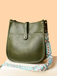 Dark green PU leather hobo crossbody bag with wide geometric patterned strap for women.