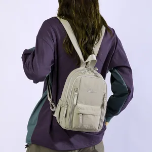 Casual versatile mini backpack for women and men, multi-functional daily commuting shoulder bag.