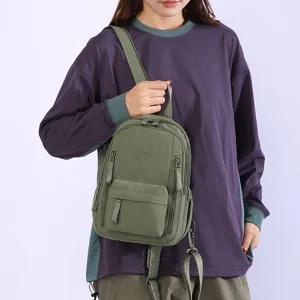 Multi-functional mini backpack for women, casual daily sling bag and chest bag in stylish green.
