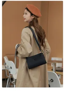 Casual women shoulder crossbody bag, stylish waterproof daily design, ideal travel handbag.