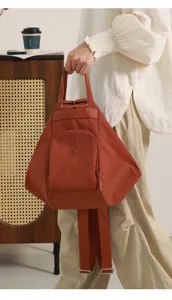 Stylish convertible nylon backpack and shoulder bag for women, casual daily commute.