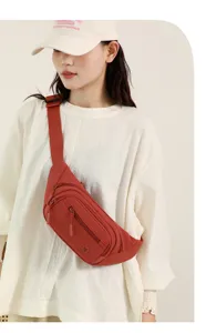 Red crossbody chest bag with multi zipper pockets for women, stylish casual daily detail.