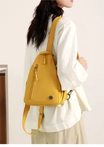 Details of the stylish yellow nylon chest bag, showing multi-layer design and comfortable wear.