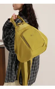 Spacious multi-functional women's backpack in stylish yellow, perfect for daily casual and commute.