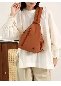 Stylish nylon chest bag for women, multi-pocket casual crossbody daypack for outdoor use.
