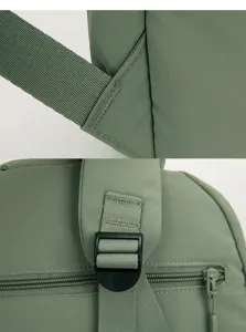 Detail view of the minimalist waterproof nylon casual backpack strap and buckle, durable and stylish.