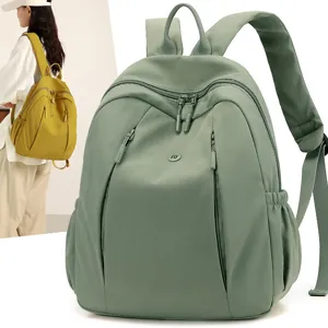 Women's waterproof nylon casual backpack, simple large capacity trendy school bag for daily use.