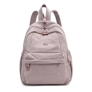 Lightweight pink nylon backpack for women, large capacity casual daypack for school travel work.