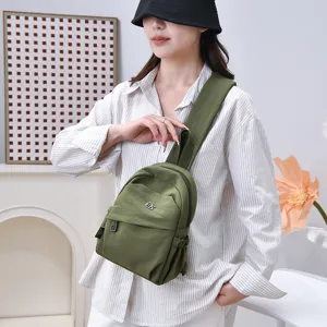 Casual green nylon women backpack, lightweight vintage daypack for daily travel and school.