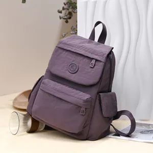 Stylish lightweight purple casual backpack for women, large capacity student travel bookbag.