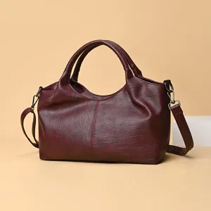 Women large capacity PU leather shoulder handbag stylish casual tote bag with adjustable strap.