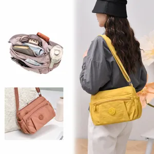Casual nylon shoulder bag for women, multi-pocket large capacity crossbody bag.