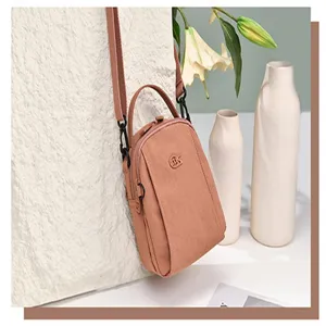 Casual nylon crossbody bag for women, lightweight multi-layer small shoulder square bag.