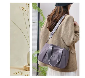 Grey purple nylon shoulder bag, large capacity waterproof tote and casual crossbody bag detail view.