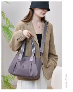 Fashionable waterproof nylon shoulder bag for women, large capacity casual tote and crossbody.