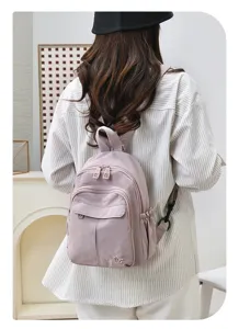 Casual waterproof nylon backpack for women, lightweight travel daypack and school bag