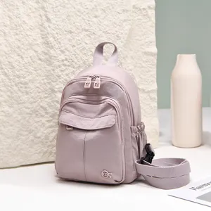 Lightweight multi-functional nylon backpack for women, casual waterproof travel daypack bag.