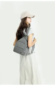 Grey casual multi-use mini backpack and shoulder bag detail view, lightweight daily wear.