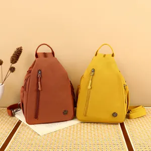 Casual nylon chest bag for women, multi-layer large capacity backpack, stylish travel daypack.