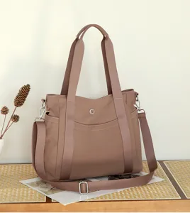 Large capacity Oxford cloth shoulder bag, casual tote and crossbody bag for women daily commute.