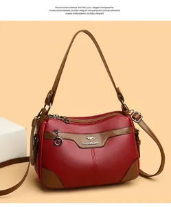 Women's red PU leather shoulder bag with multiple compartments, vintage style and top handle.