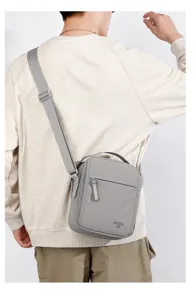 Men's casual grey oxford cloth shoulder crossbody bag, versatile daily commuter side bag.