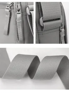 Detailed view of men casual crossbody bag, durable oxford cloth, smooth zippers and straps.