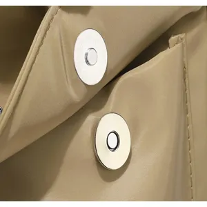 Close-up of minimalist crossbody bag hardware and durable fabric texture, exquisite details.