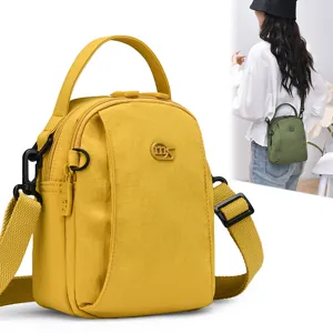 Lightweight nylon crossbody bag for women, multi-layer casual small square shoulder bag.